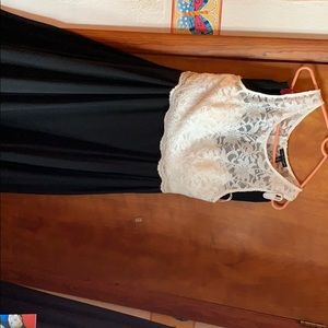 White floral top with a long black skirt (2 pc)